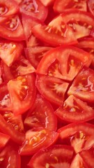 Wall Mural - Sliced red tomatoes, rotation