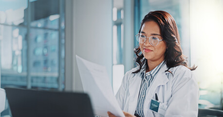 Wall Mural - Woman, doctor and smile with paperwork or laptop for research or study results and feedback. healthcare, medical and happy or satisfied with document for medicine or patient information in office