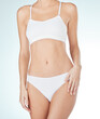 © Flashizzle/peopleimages.com - Underwear, woman and beauty in studio for health, wellness and self care with model aesthetic. Girl, lingerie and natural body with epilation or waxing for slimming transformation on white background