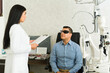 © AntonioDiaz - Eye health discussion between doctor and patient wearing an eye patch for his recovery