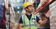 © peopleimages.com - Man, logistics and inspection of warehouse distribution safety, quality control and manufacturing development. Male person, speaking and engineer at shipping site, inventory freight and cargo process