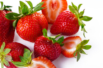 Wall Mural - Group of Juicy Strawberry with half sliced isolated on white background.