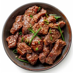 Wall Mural - Delicious Sesame Beef Stir Fry With Green Onions and Chili Flakes in a Black Bowl