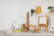 © Pixel-Shot - Interior of light playroom with toys, rocking horse and whiteboard in kindergarten