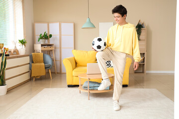 Poster - Teenage boy playing with soccer ball at home