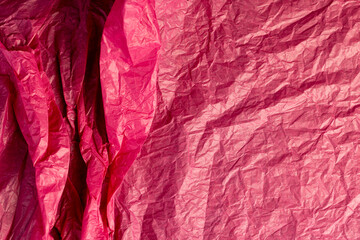 beautiful crumpled pink wrapping paper