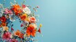 © tinnakorn - Colorful flower wreath with a mix of vibrant flowers against a bright blue background. Ideal for spring and summer themes.