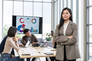 Happy diverse group Asian business start up freelance team analyzing statistics financial. Group Team of business people meeting conference discussion various topic corporate concept in office.