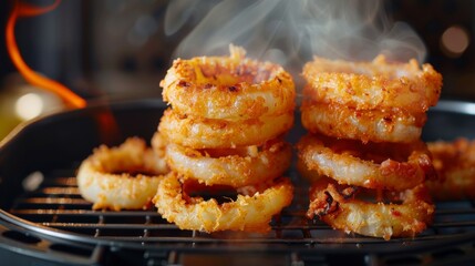 Envision a stack of crunchy onion rings cooking in the air fryer
