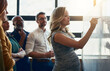 © NonVig/peopleimages.com - Office, pregnant woman and writing in whiteboard for strategy or planning and idea as project manager. Leader, teamwork and collaboration as employees with mission, solution and workshop for business