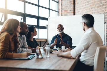 Leinwandbilder - Mature, manager and business meeting in boardroom with discussion for financial growth at table. Company, vision and planning in workshop with mentor, staff and teamwork training in accounting firm.
