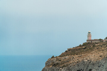 Wall Mural - Landscape, San Antonio cape, with a lighthouse, in Jávea, Alicante (Spain).