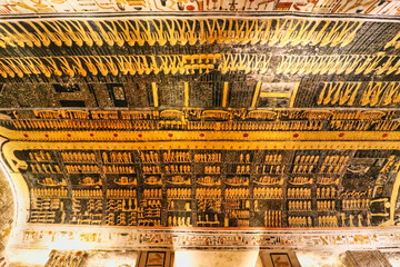 Bottom up view of the magnificent ceiling painting of the scene from the Book of the Day with God Nut upholding the heavens in the Tomb of Ramesses V and VI,KV9, in the Valley of Kings,Luxor,Egypt