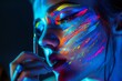 © ChaoticMind - Partial view of a person blurred out with glowing neon lights illuminating the surroundings, emphasizing color and contrast