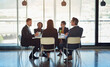 © peopleimages.com - Meeting, planning and group of business people in office with legal case for company bankruptcy. Discussion, teamwork and professional attorneys work on financial corruption law project in boardroom.
