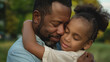 © Sunday Cat Studio - Father and daughter hugging each other