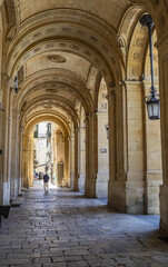 Sticker - Tipical street of La Valletta with wooden terraces in Malta.