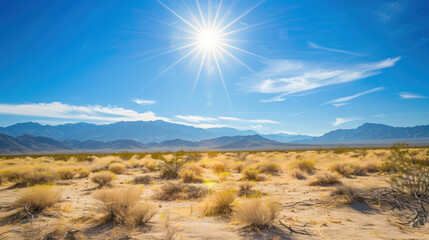 A hot desert landscape with a blazing sun and clear blue sky