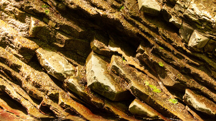 Sticker - Layers of rock as an abstract background. Texture