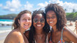 © Sawyer0 - Three women smiling and posing for a photo on the beach. Their happy faces and casual gestures suggest that they are enjoying their time spent on the beach.