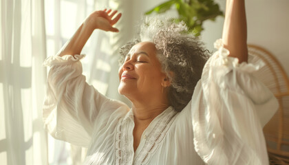 This image features a woman basking in sunlight with eyes closed and arms raised, exuding a sense of bliss and serenity in a bright, airy room surrounded by green plants. Mental health beauty concept.