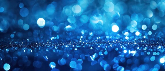 Wall Mural - A bright blue bokeh background with blurred lights, creating a festive and colorful atmosphere suitable for Christmas designs