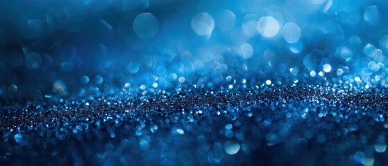 Wall Mural - A bright blue bokeh background with blurred lights, creating a festive and colorful atmosphere suitable for Christmas designs