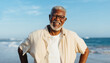 © (JLco) Julia Amaral - Joyful senior man smiling at the beach