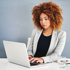 Poster - Business, thinking and black woman with laptop, typing and website info, research for article and journalist in modern office. person, worker and agent with internet, pc and connection with network