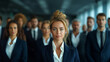 © Viorel Sima - adult businesswoman in navy blue suit being the CEO and leading the team