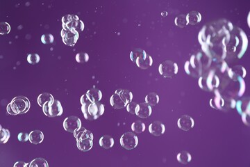 Canvas Print - Beautiful transparent soap bubbles on purple background