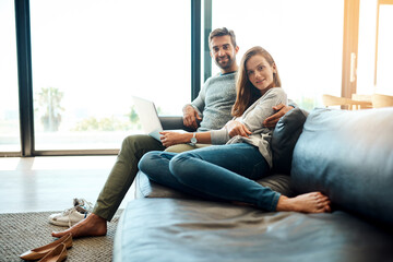 Sticker - Portrait, happy couple and laptop in living room for relax, support nad connection for love together. Man, woman and smile by computer in home for social media, news and streaming on website on sofa