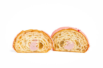 Canvas Print - A croissant with berry cream filling cut in half