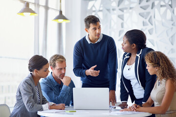 Leinwandbilder - Business people, laptop and cooperation with conversation, brainstorming and professional in modern office. Staff, employees and coworkers with ideas, collaboration and teamwork with planning or pc