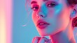 © Doni_Art - beautiful woman's face on a stylish neon pink and pastel blue background.