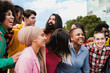 © Vane Nunes - Multiethnic young people having fun together outdoor - Diverse friends youth community