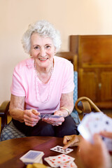 Canvas Print - Poker, portrait and senior woman with friends playing cards in retirement home together. Assisted living, community or games with happy elderly people in apartment for bonding, fun or leisure