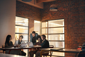 Poster - Business people, meeting and teamwork with laptop at night for research and lead generation. Writers room, journalists and employees planning article with tech for feedback, help and collaboration