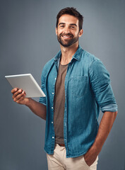 Poster - Tablet, smile and studio with man portrait, scroll and social media on gray background. Internet, online and communication for texting on dating app, chat and happy male person on technology for love