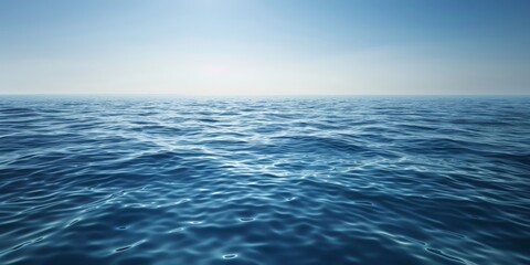 a photo of calm blue ocean water on a sunny day. the water is clear and the sky is bright