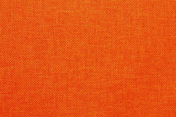 Wall Mural - Orange fabric cloth texture background, seamless pattern of natural textile.