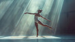 © khonkangrua - Graceful ballet dancer striking a pose in a sunlit studio, with dramatic light rays highlighting her form.
