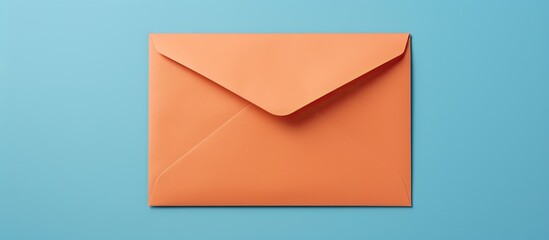 Poster - A mock up copy space image of a beige envelope with a blank orange sheet of paper inside is seen lying on a blue background The top view and flat lay perspective depict the concept of receiving mail