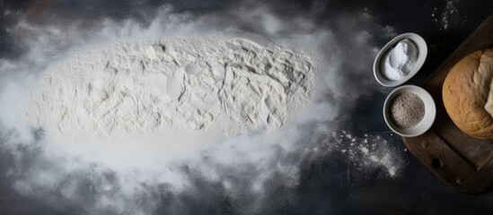 Aufkleber - A top down view of a dark table covered in a powdery texture resembling white flour and sand The background is suitable for baking or cooking food There is ample space for advertising text making it