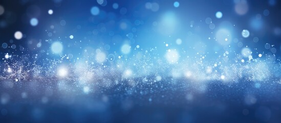 Poster - a magical blue bokeh with blinking stars and falling snowflakes creates an abstract christmas backgr