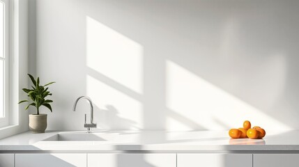 Poster - Minimalist kitchen interior with white countertops, a modern faucet, a potted plant, and a group of oranges on the counter, illuminated by natural light from a window.