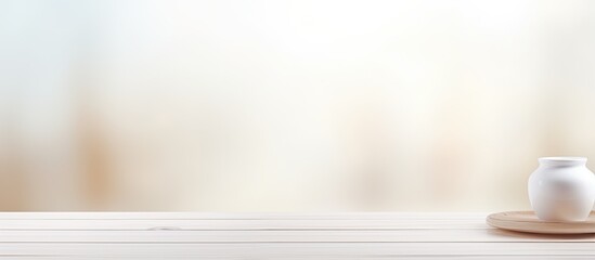 Poster - A white wooden table sits empty against a blurred interior background providing a clean and versatile copy space image with a white color tone