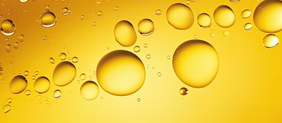 Aufkleber - Abstract art featuring a stunning macro shot of water droplets in oil set against a captivating yellow background Perfect as a copy space image