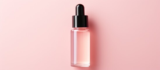 Aufkleber - A hyaluronic acid serum bottle labeled 100 is placed on a solid pale pink background The image is close up and taken from a top view showing copy space