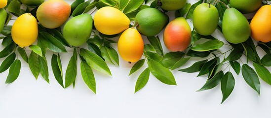 Aufkleber - A vibrant tropical fruit concept is depicted in a close up top down view of a visually appealing assortment of chopped mangoes adorned with green leaves The bright white timber background adds to the